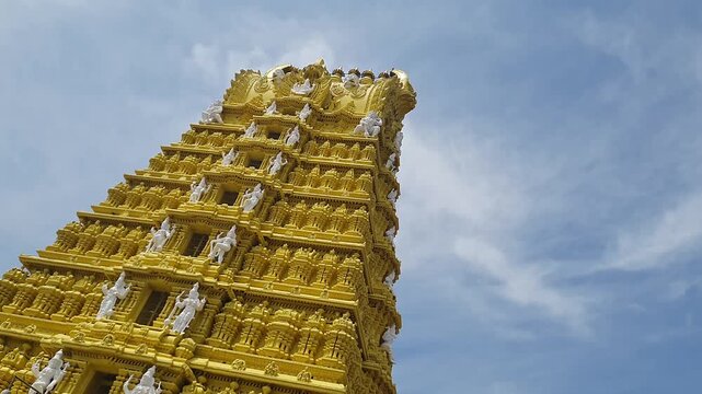 A close-up view of the Sri Chamundeshwari Temple Gopuram, dedicated to a fierce form of Shakti.