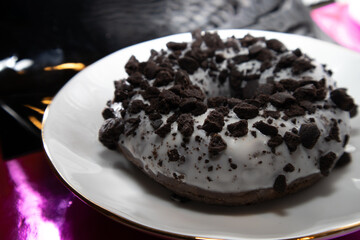 donut with chocolate icing and sprinkles