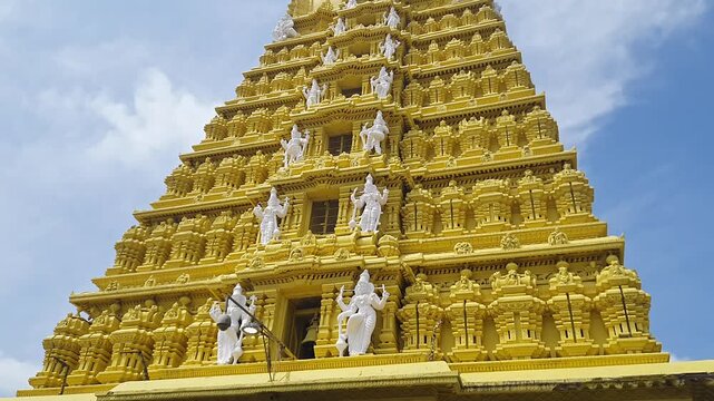 A close-up view of the Sri Chamundeshwari Temple Gopuram, dedicated to a fierce form of Shakti.