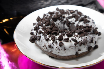 donut with chocolate icing and sprinkles