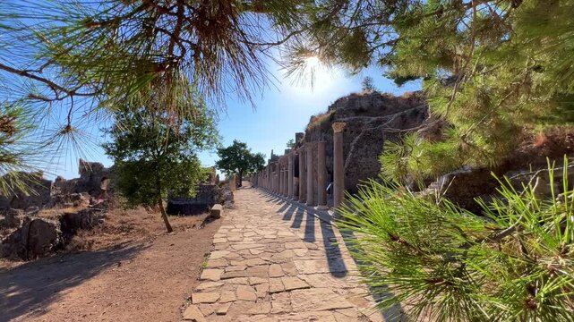 Ruins of the ancient Roman port city of Siedra in Alanya, Antalya, Turkey. The street and ruins of the ancient abandoned ancient city of Siedra on the Mediterranean coast. 4К