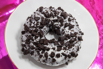 donut with chocolate icing and sprinkles