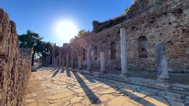 Ruins of the ancient Roman port city of Siedra in Alanya, Antalya, Turkey. The street and ruins of the ancient abandoned ancient city of Siedra on the Mediterranean coast. 4К