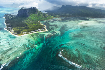 Aerial view of the lagoon and underwater waterfall optical illusion near Le Morne Brabant, Mauritius, Indian Ocean