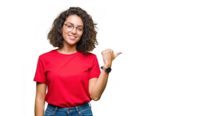 Young woman wearing glasses and red t shirt pointing to the right isolated on transparent background