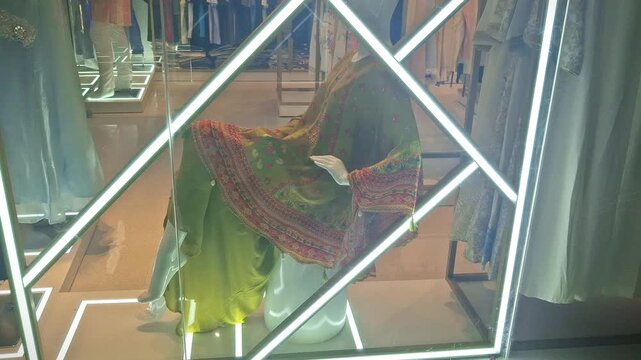 Vibrant Traditional Dress Display in Boutique | Fashion Store Window Showcase Video