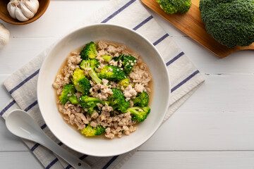 Stir fried broccoli with minced pork in white plate.Thai Healthy food.Top view.