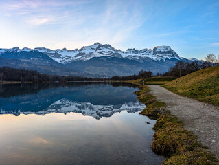 Sunset at Lac de Passy lake in Domancy, France in winter