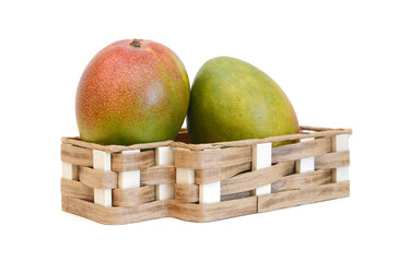 Mango fruits isolated in basket on white background