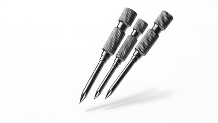 Precision Instruments: Three meticulously crafted metal instruments with textured handles are artfully arranged, a testament to the blend of functionality and design.