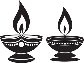Two traditional indian oil lamps diya with flames burning brightly isolated on white background