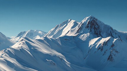 Majestic snow-capped mountain peaks under a clear blue sky, a serene and vast winter landscape showcasing pristine alpine beauty and dramatic rugged terrain.