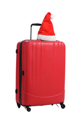 Santa hat on red suitcase against white background. Christmas vacation
