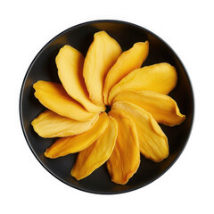 Dried mango slices arranged in a circular pattern on a dark plate