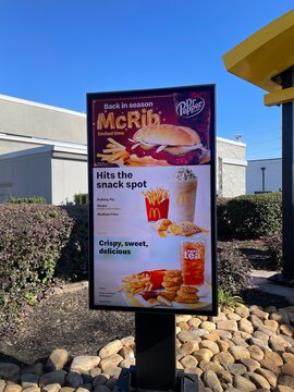 McDonalds drive thru sign clear blue sky