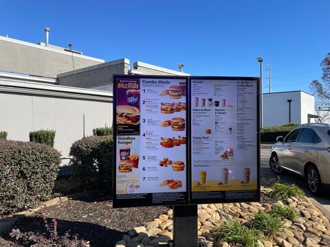McDonalds drive thru menu clear blue sky