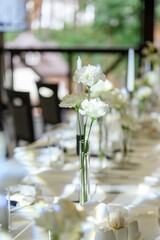 beautiful wedding table setting with flowers and candles