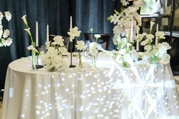 beautiful wedding table setting with flowers and candles