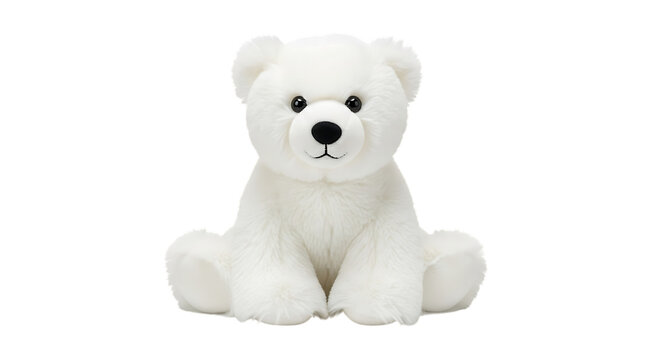 White plush polar bear toy sitting on black background