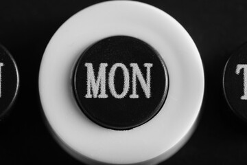 Abbreviated designation day week on calendar in close up, Monday.