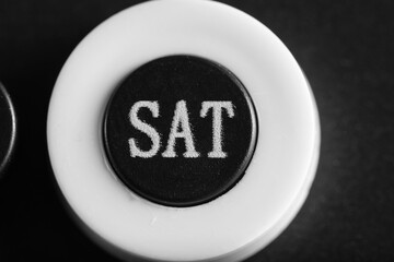 Abbreviated designation day week on calendar in close up, Saturday.