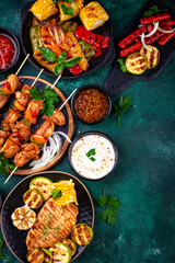 Assortment of grilled bbq meat and vegetables