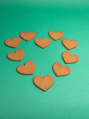 gingerbread hearts on a green background