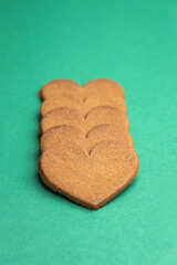 gingerbread hearts on a green background