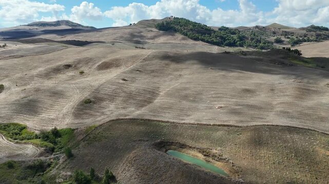 Amazing drone video of the Sicilian countryside, near Villa Dafne, an agroturismo acienda, located in the North of Sicily, Italia, during a lovely summer day
