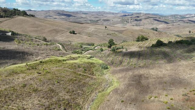 Amazing drone video of the Sicilian countryside, near Villa Dafne, an agroturismo acienda, located in the North of Sicily, Italia, during a lovely summer day