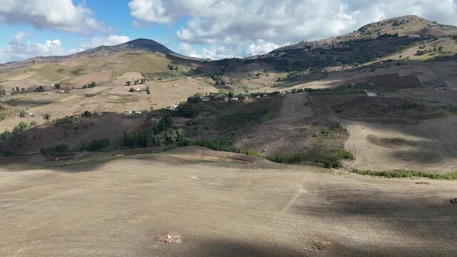 Amazing drone video of the Sicilian countryside, near Villa Dafne, an agroturismo acienda, located in the North of Sicily, Italia, during a lovely summer day
