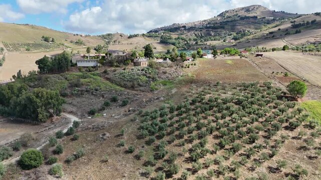 Amazing drone video of the Sicilian countryside, near Villa Dafne, an agroturismo acienda, located in the North of Sicily, Italia, during a lovely summer day
