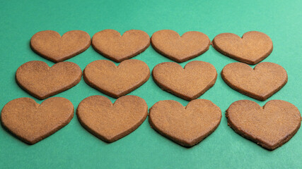 gingerbread hearts on a green background