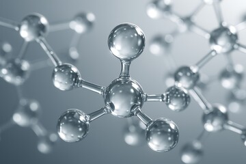 Transparent glass molecule structure on soft gray background representing chemistry, nanotechnology and scientific research.