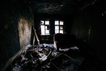 Aftermath of fire. Burnt room interior
