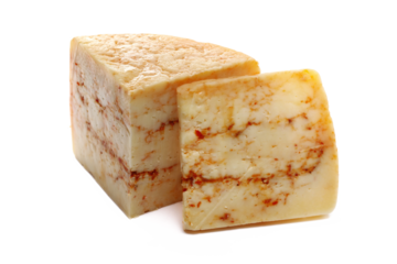 cheese with red crushed paprika isolated on white background