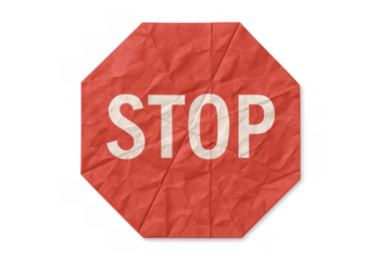 Crumpled red paper stop sign with white stop text. Expressing warning, restriction, and prohibition on a transparent background