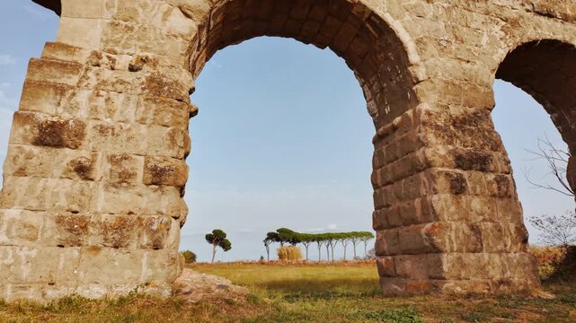 The sun sets on the Park of the Aqueducts or Parco degli Acquedotti in Rome, Italy