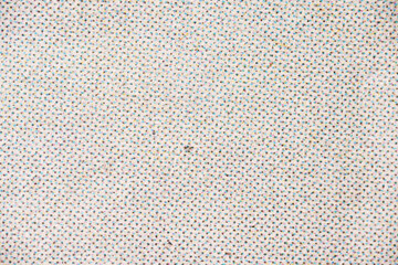Macro Image of CMYK Dots on White Textured Paper