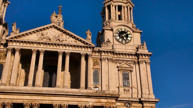 The facade of St Paul's Cathedral during sunset in London, England, UK