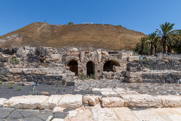 Ruins of building with three arches at Beit She'an National Park in Israel.
