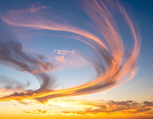 Vivid sunset with streaked clouds swirling across the sky