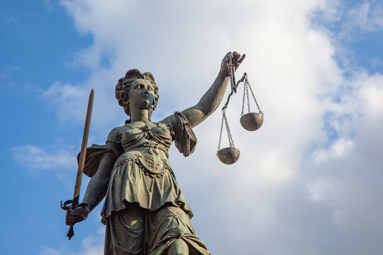Statue of Lady Justice in front of the Romer in Frankfurt - Germany
