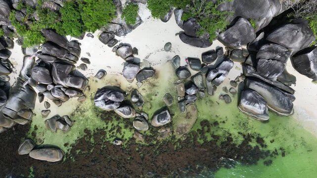 Belitung beach drone view, Tanjung Tinggi beach, a beautiful tropical beach with big rocks in Belitung, Indonesia. Also known as Laskar Pelangi beach
