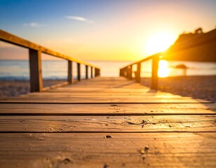 Wooden boardwalk leading to ocean beach at sunset