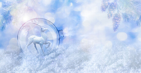 Festive christmas globe with reindeer in winter forest