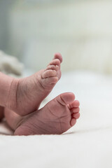 Newborn baby feet showing innocence and new life