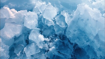 Obraz premium Bright sunlight shines on various ice chunks floating in clear blue water at a lake shore. The scene captures the melting ice on a warm day.