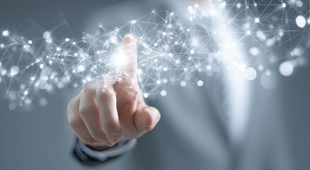 Finger touches glowing, interconnected digital network of light points