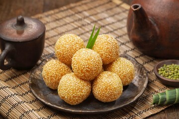Onde-onde or sesame balls are a type of market snack cake that is famous in Indonesia. Sesame balls are easy to find in traditional markets or sold at street vendors